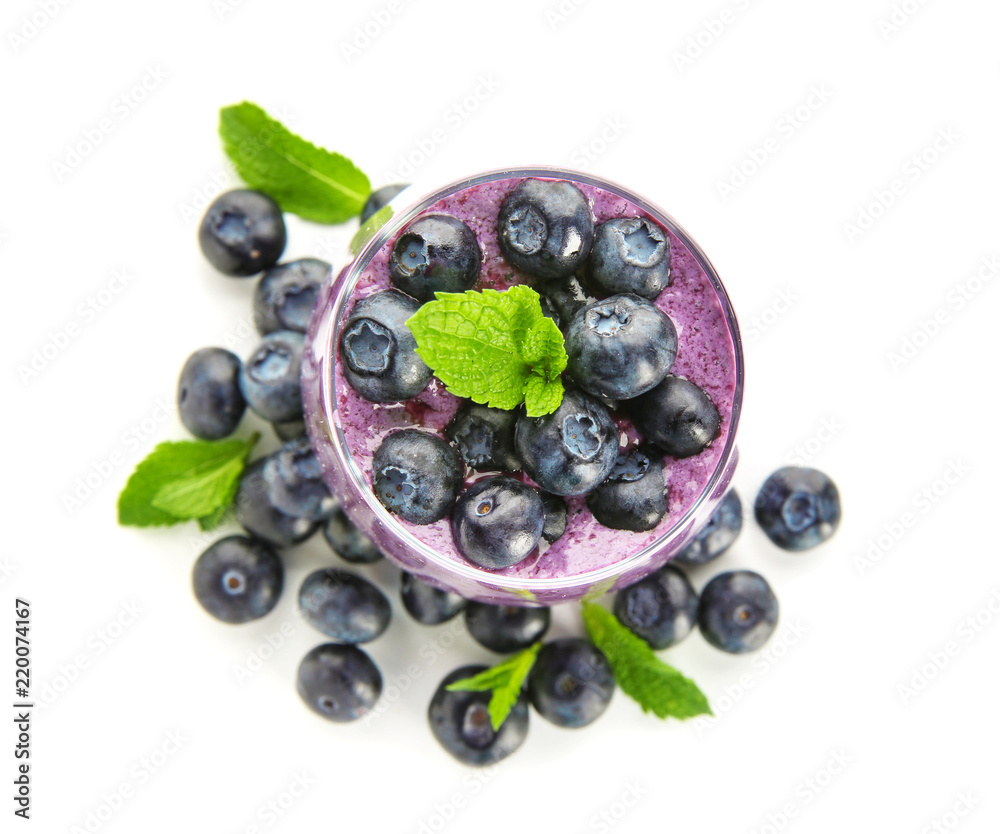 Glass of tasty blueberry smoothie on white background, top view Glass of tasty blueberry smoothie on white background, top view