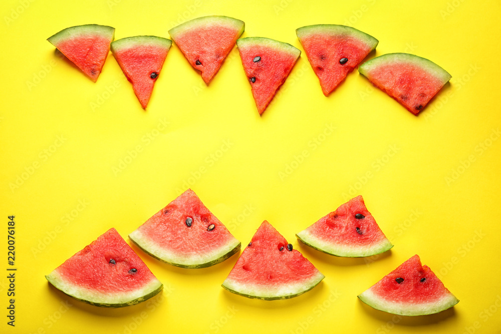 Delicious sliced watermelon on color background Delicious sliced watermelon on color background