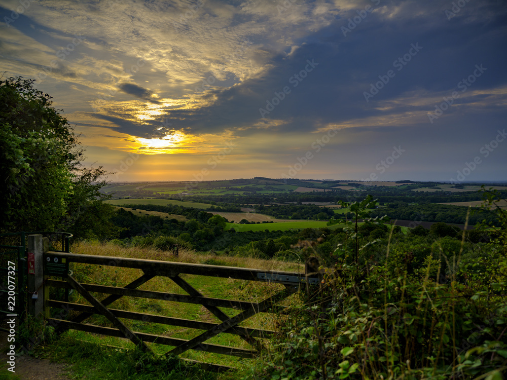 Summer sunset over Beacon Hill from the weather station on Old Winchester Hill, in the South Downs National Park, Hampshire, UK
