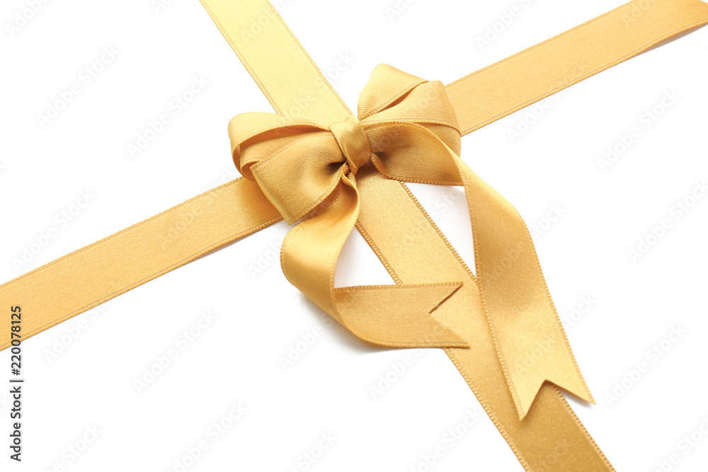 Fototapeta premium Golden ribbons with bow on white background