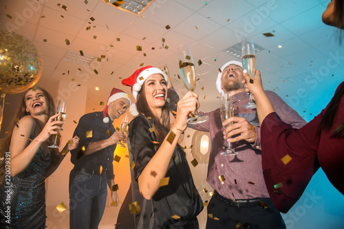 Joyful friends celebrating ...