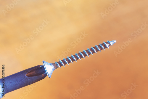 Obraz na plátně surup on the screwdriver / small repair a time before tightening the screws