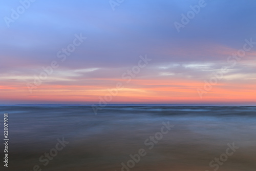 sunrise on the water / Early summer morning bright sky Beach