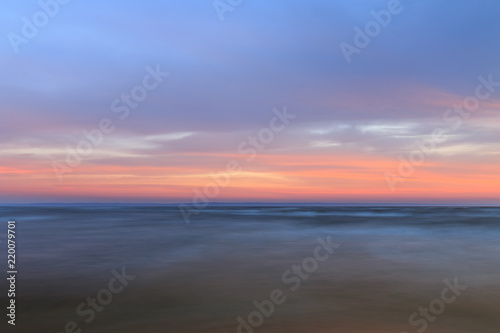 sunrise on the water   Early summer morning bright sky Beach