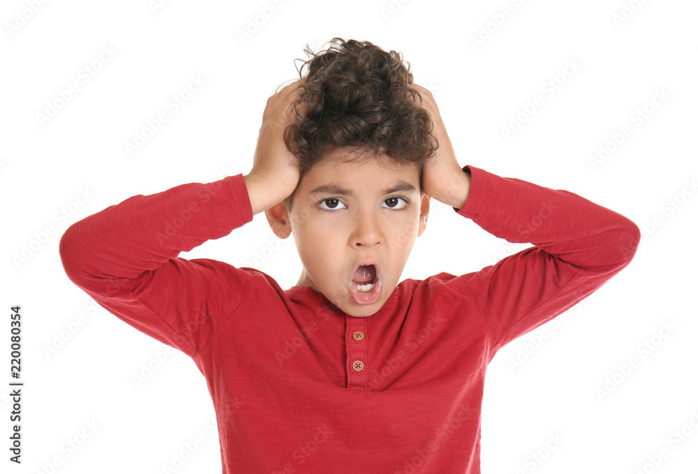 Emotional little boy on white background