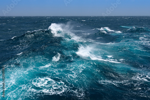 Big waves at open sea. Summer monsoon in Indian Ocean