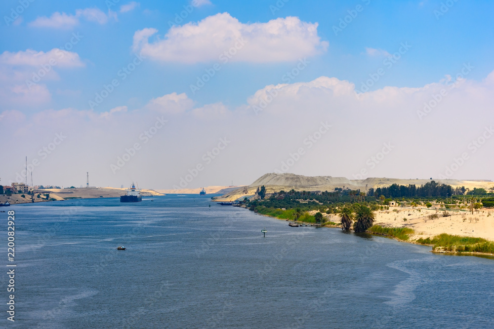 Cargo ship passing Suez Canal, Egypt
