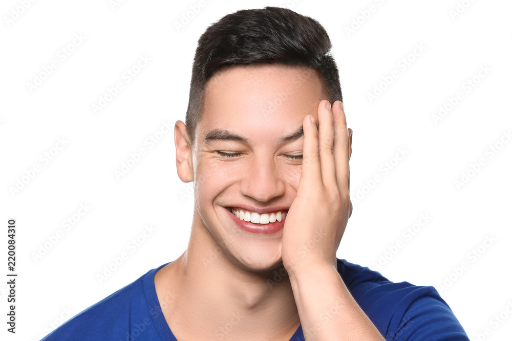 Young man with healthy teeth smiling on white background Young man with healthy teeth smiling on white background