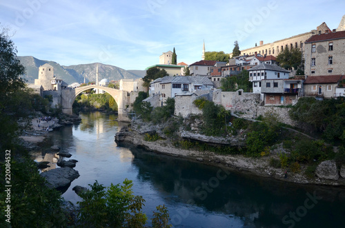 Stari Most  literally   Old Bridge   is a rebuilt 16th-century Ottoman bridge in the city of Mostar in Bosnia and Herzegovina that crosses the river Neretva and connects the two parts of the city. 