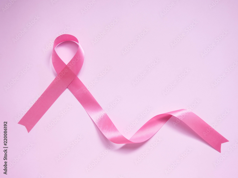 Pink ribbon awareness symbol for supporting breast cancer patient on pink  background with copy space. Breast Cancer Awareness Month in October.  Women's health care and medical concept. Stock Photo | Adobe Stock