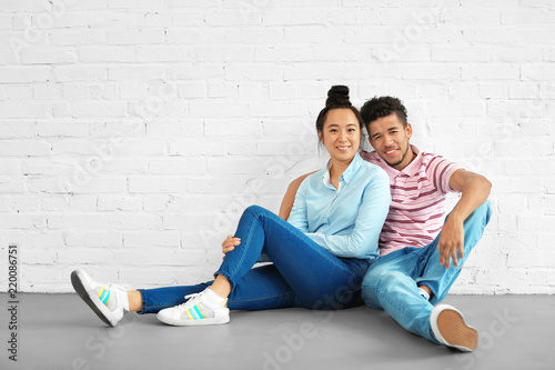 Happy interracial couple si...