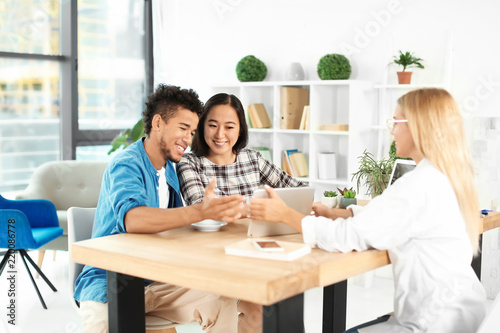 Happy interracial couple wi...