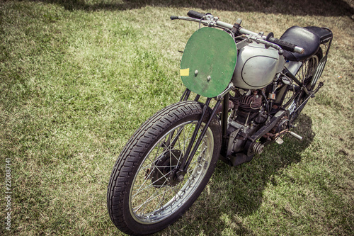 Classic racing motorcycle on grass