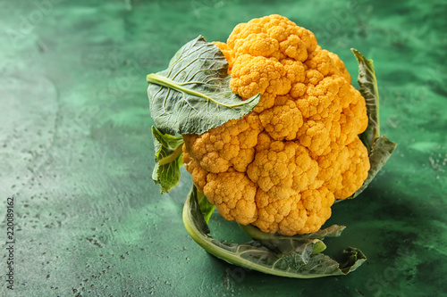 Yellow cauliflower on color background