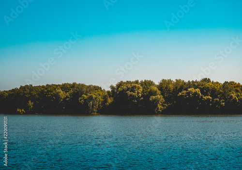 blue river and green forest - for nature themes