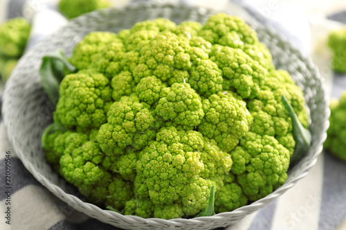 Bowl with green cauliflower cabbage, closeup