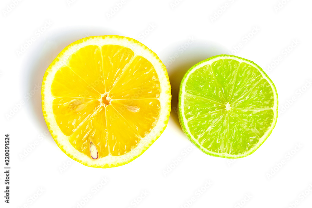 slices of yellow fresh lemon and green lime, isolated on white background. Tasty and healthy food slices of yellow fresh lemon and green lime, isolated on white background. Tasty and healthy food