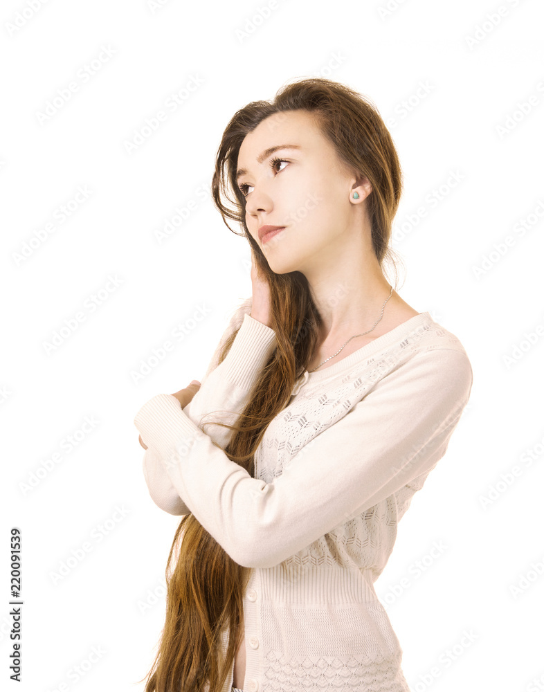 Emotions of a beautiful girl with long hair, in a white jacket posing in Studio on a white background. Emotions of a beautiful girl with long hair, in a white jacket posing in Studio on a white background.
