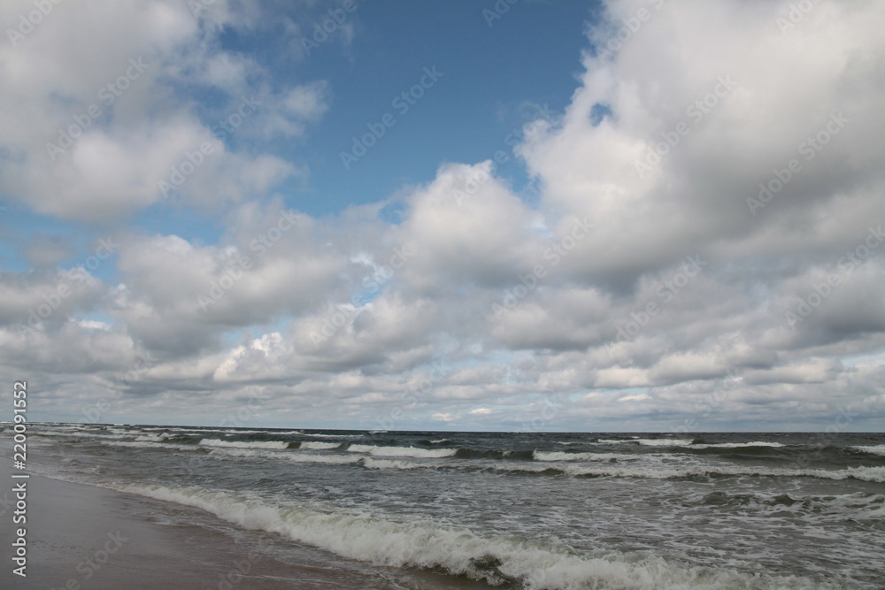cloudy sky upon Baltic sea water