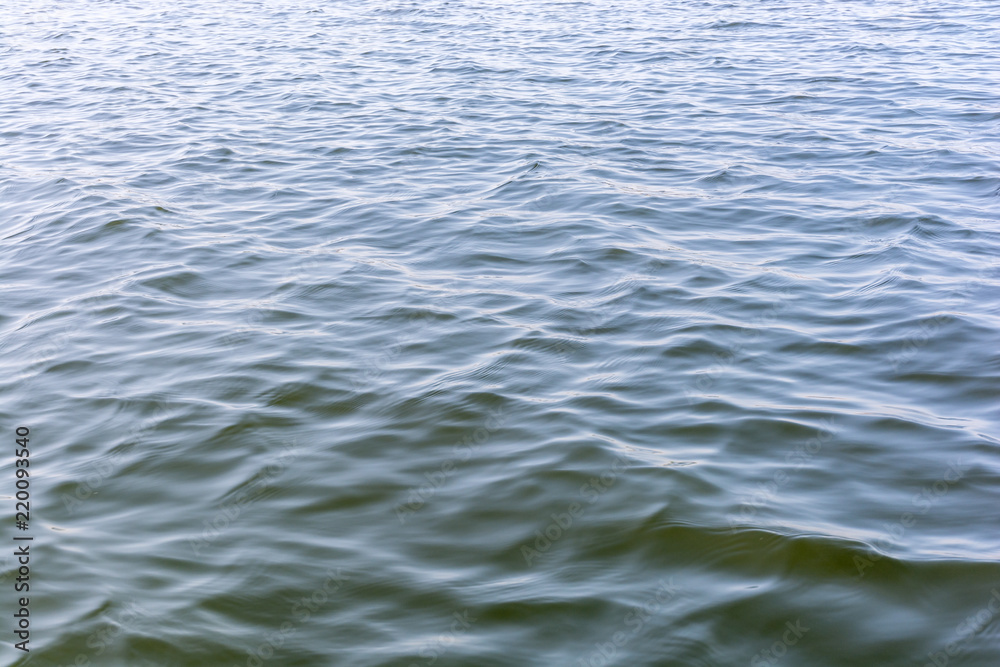 Naklejka premium Kleine Wellen auf dem Meer als Textur