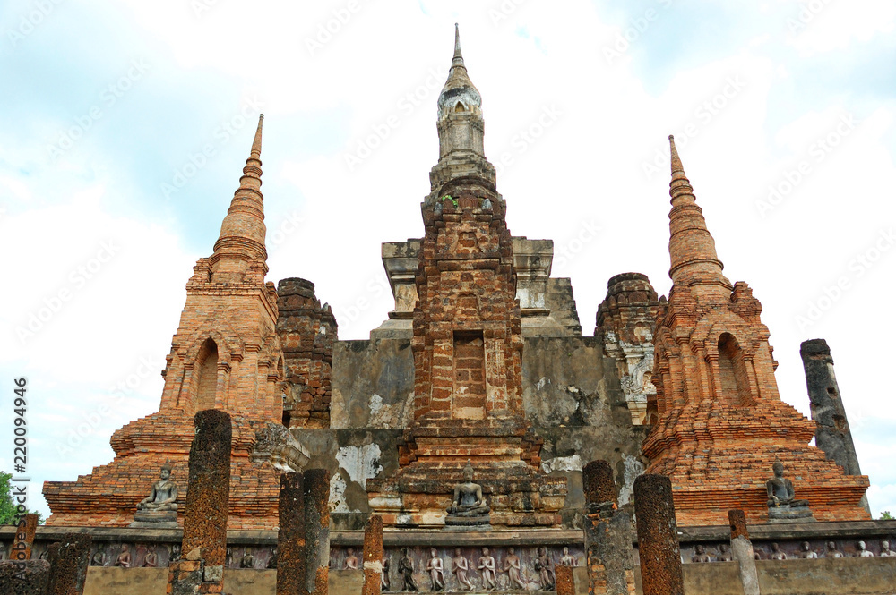 Ancient statues and buildings in sukhothai historical park, Thailand