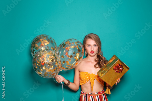 Beautiful young woman with ...