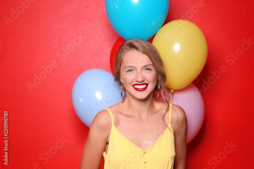 Beautiful young woman with ...