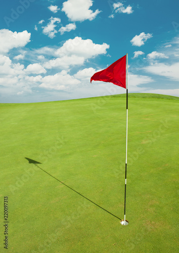 Golf course with red flag