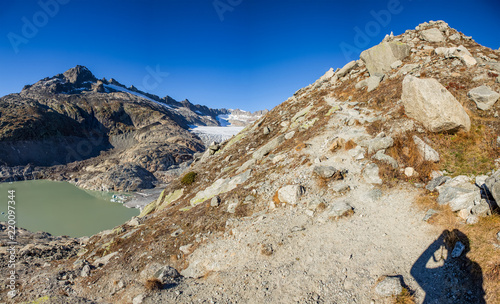 Hiking at the Furka Pass in Switzerland photo