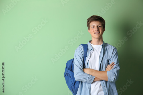 Teenage boy with backpack o...