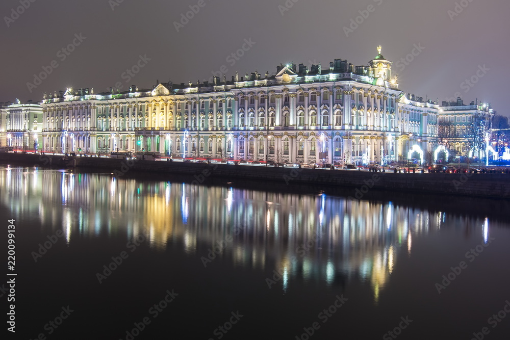 Hermitage (Winter Palace) and Neva river at night during New Year and Christmas holidays, Saint Petersburg, Russia