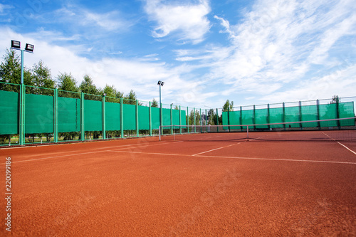 Outdoor priming court for playing tennis. Sunny summer day © Кристина Корнеева