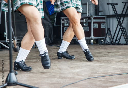 female legs of three irish dancers