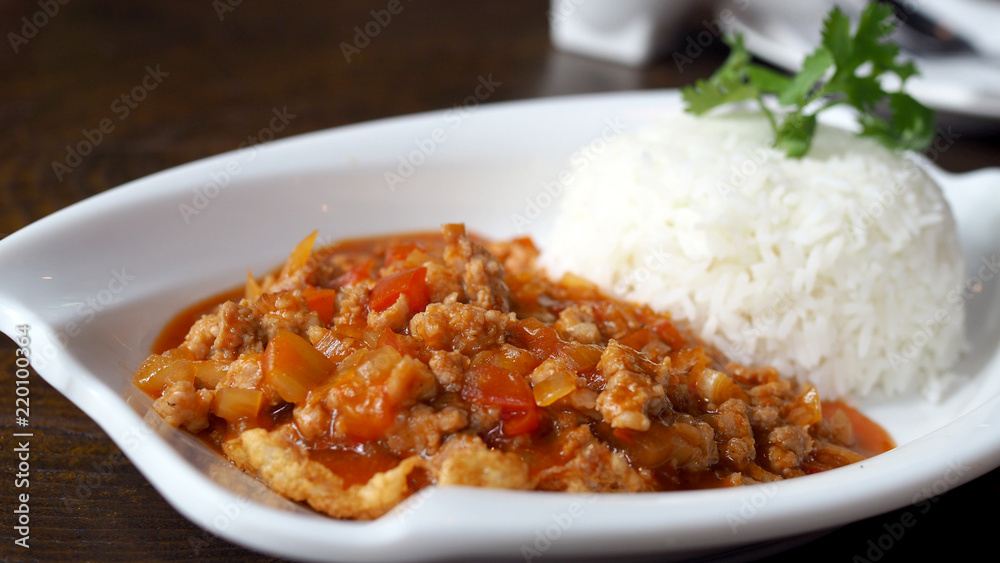 Fried pork with tomato sauce. Eggs bomb,cooking Thai Food. Fried pork with tomato sauce. Eggs bomb,cooking Thai Food.