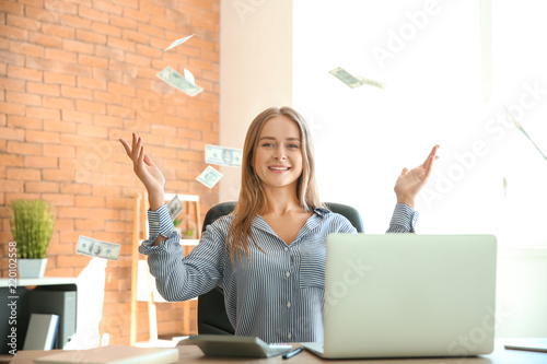 Happy businesswoman with lo...
