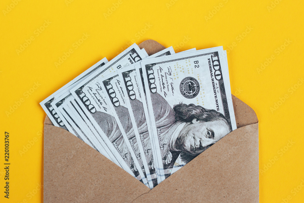 custom made wallpaper toronto digitalPaper envelope with money on a yellow background.
