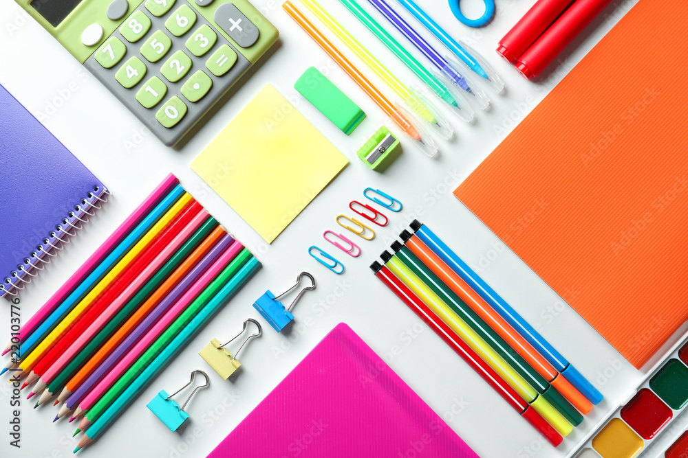 Fototapeta premium Composition with different school stationery and calculator on white background