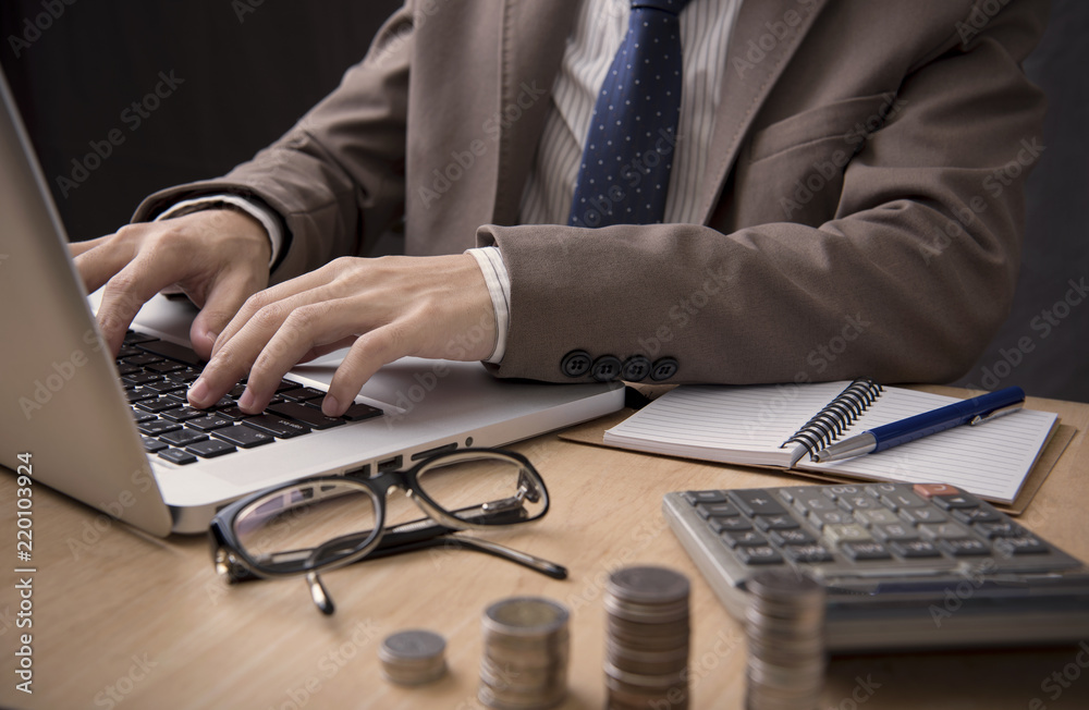Businessman accountant working on desk office. concept marketing research finance accounting. Businessman accountant working on desk office. concept marketing research finance accounting.