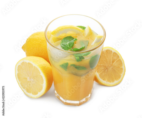 Glass of fresh cocktail with lemon on white background