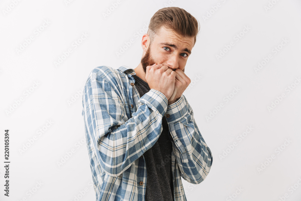 Portrait of a frightened young bearded man Portrait of a frightened young bearded man