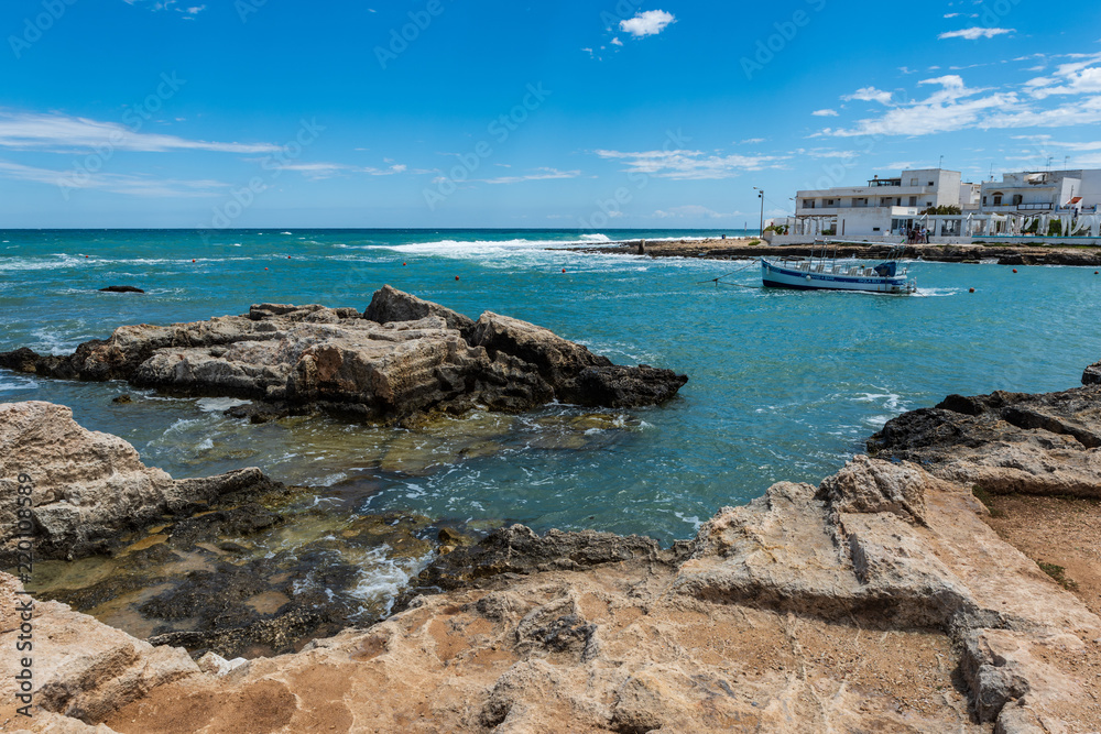 Enchanted sea. Boats in the bay of the abbey of San Vito Enchanted sea. Boats in the bay of the abbey of San Vito