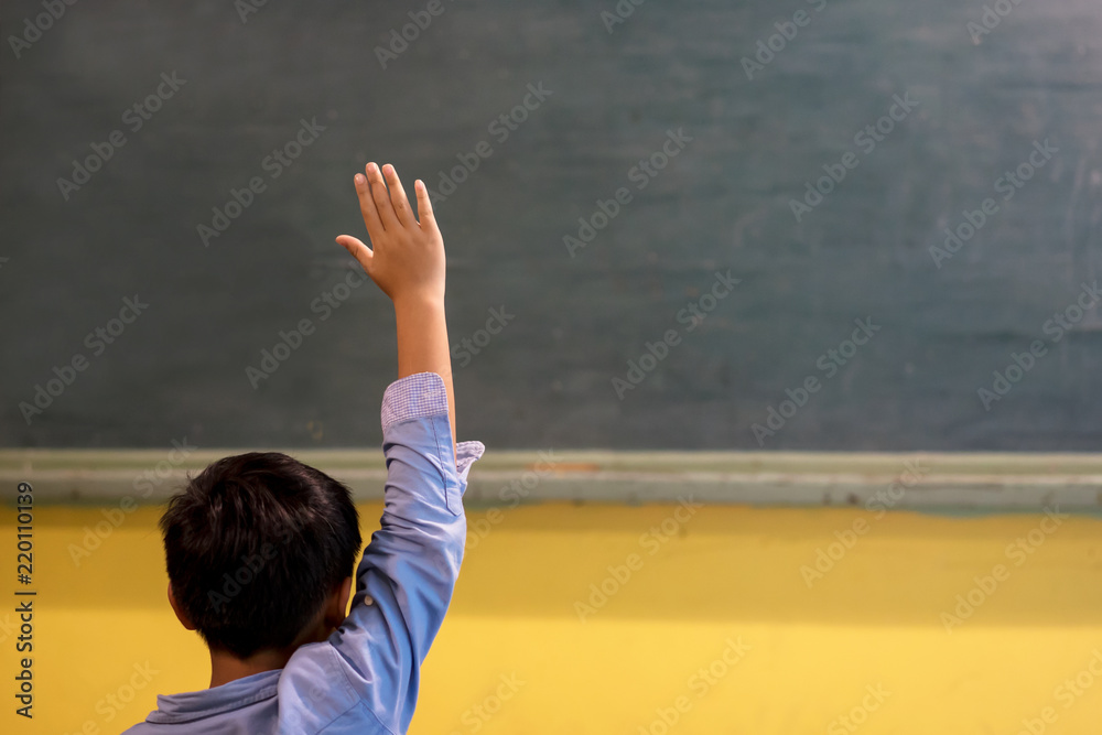 A School kid in classroom at lesson Stock Photo | Adobe Stock