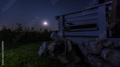 Night sky with full moon - motion time lapse  photo