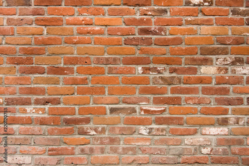 Weathered Red and White Brick Wall