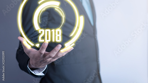 businessman pressing a 2018 year start button happy success celebration. New year a future part