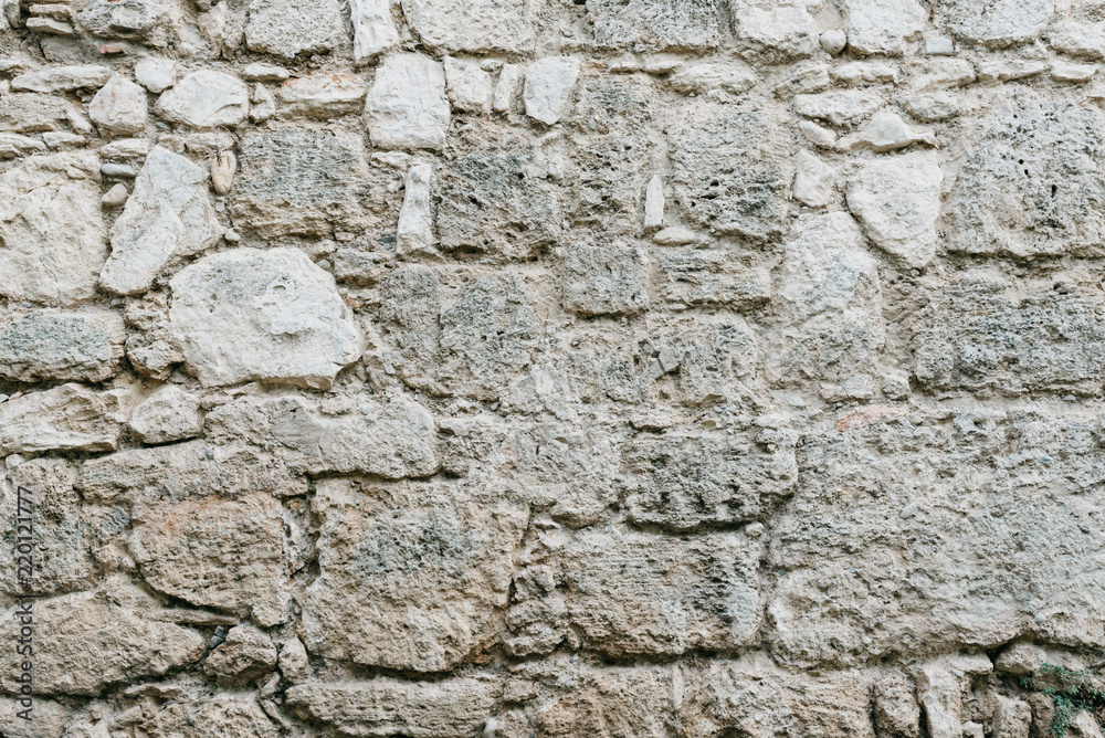 Big gray stone wall. Stone texture