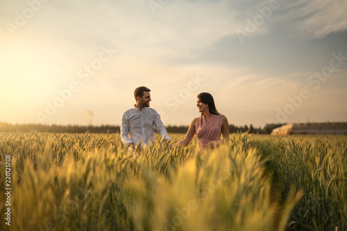Romantic Couple on a Love Moment at gold wheat flied - Holambra, Sao Paulo, Brazil