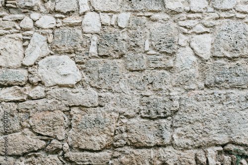 Big gray stone wall. Stone texture