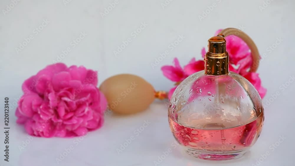 Glass perfume bottle water drops rose flowers Glass perfume bottle water drops rose flowers