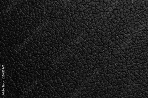black leather texture or background with spotlight, dark tone. © ooddysmile